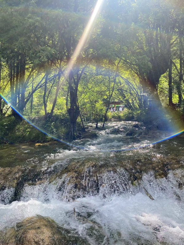 Rainbow and mist at Pearl Shoal Waterfall